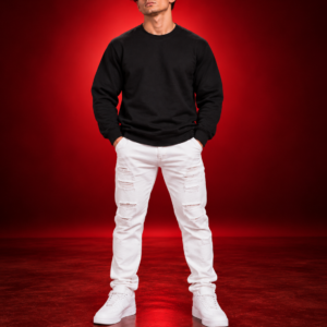Male model wearing a black Gildan 18000 crewneck sweatshirt, front view on a red studio background