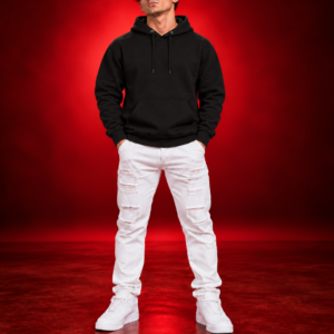 Male model wearing a black Gildan 18500 pullover hoodie, front view on a red studio background